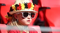 A Germany fan watches the international friendly with Chile this week 