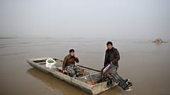 Pescadores en el Río Amarillo (China)