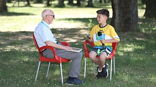 Children reflect on the current state of journalism at Football for Friendship