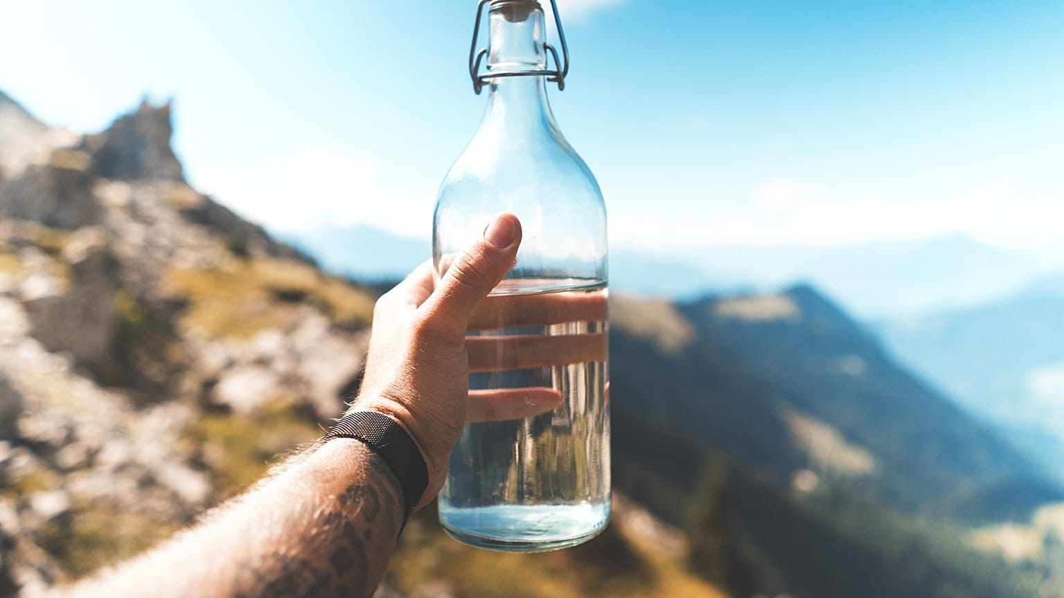 Glass water bottle, reusable.