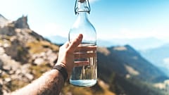 Glass water bottle, reusable.