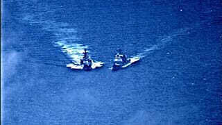 US and Russia blame each other after warships almost collide in East Asian waters