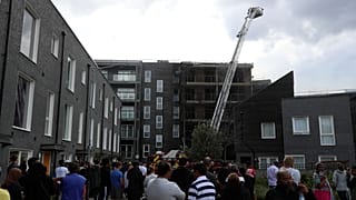Fire breaks out at London flats as 100 firefighters deal with emergency