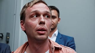 Russian investigative journalist Golunov attends a court hearing in Moscow
