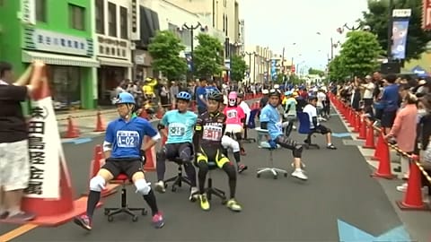 Office chairs make for unusual Formula One in Japan
