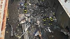 One dead as helicopter crashes into building in midtown Manhattan