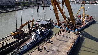 Watch: Boat involved in deadly collision lifted from Danube