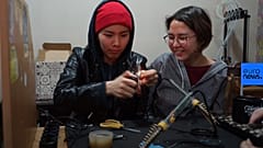 Девушки строят первый киргизский спутник