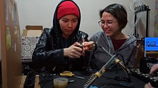 Девушки строят первый киргизский спутник