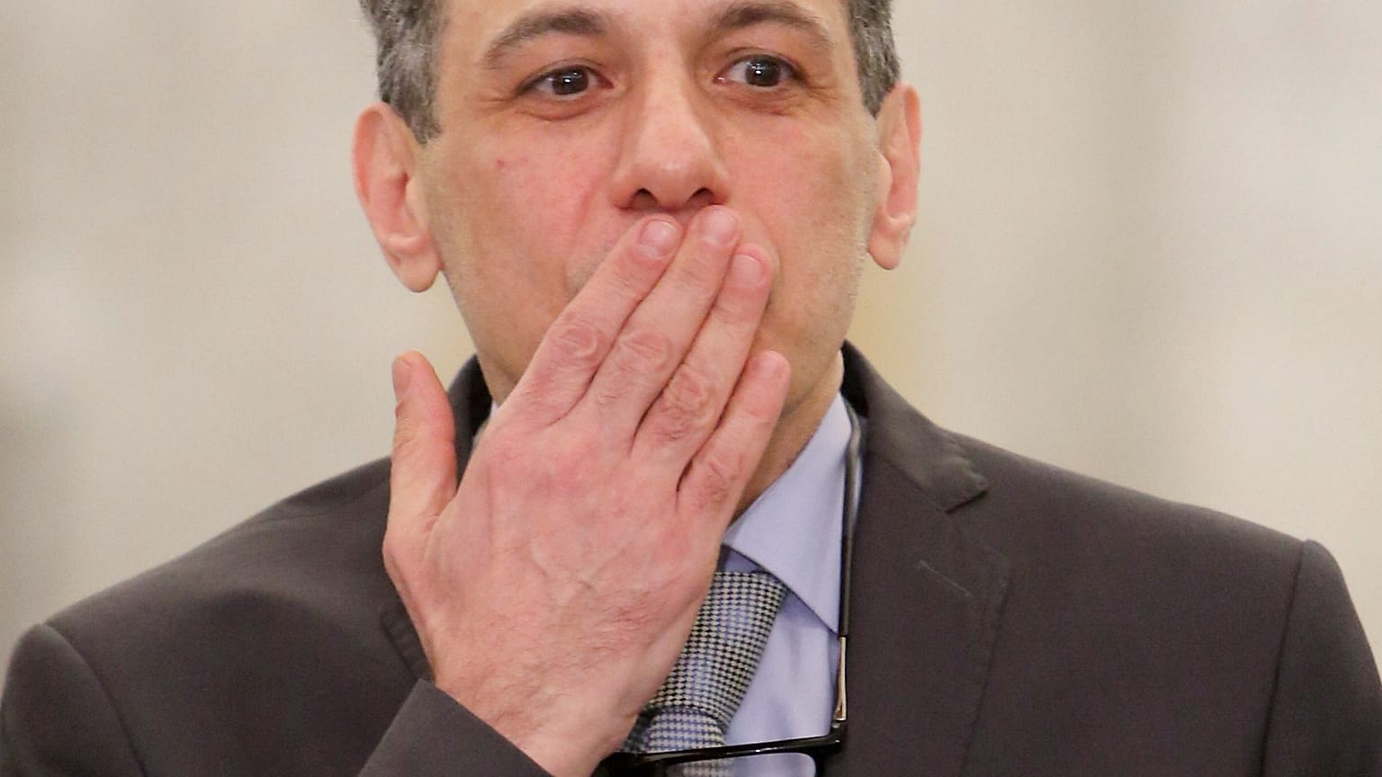 Nizar Zakka, who had been detained in Iran since 2015, gestures as he arrives in Lebanon 