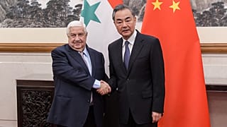 المعلم برفقة نظيره الصيني