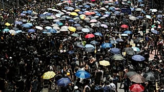 Black-clad protesters demand full withdrawal of Hong Kong extradition bill