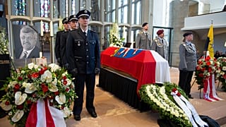 An honour guard made of Police and Federal Armed Force officers stands next to the coffin of the Kassel District President, Walter Luebcke, who was shot, during his funeral