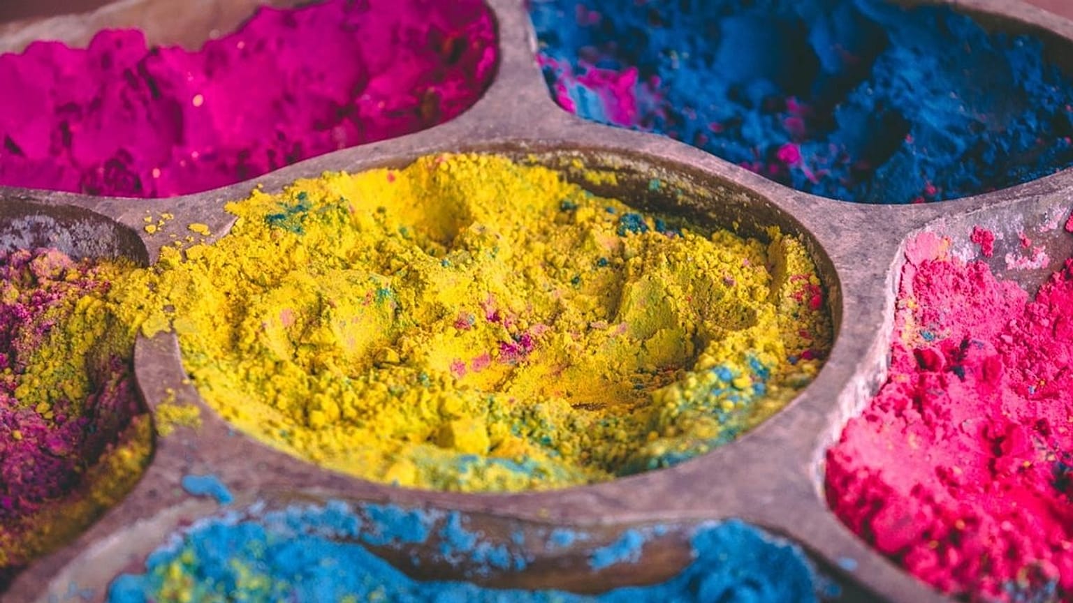 Brightly coloured fabric dye 