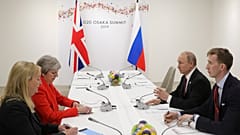 Russia's President Vladimir Putin and Britain's Prime Minister Theresa May attend a meeting on the sidelines of the G20 summit in Osaka, Japan June 28, 2019