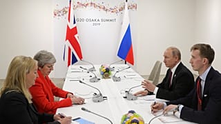Russia's President Vladimir Putin and Britain's Prime Minister Theresa May attend a meeting on the sidelines of the G20 summit in Osaka, Japan June 28, 2019