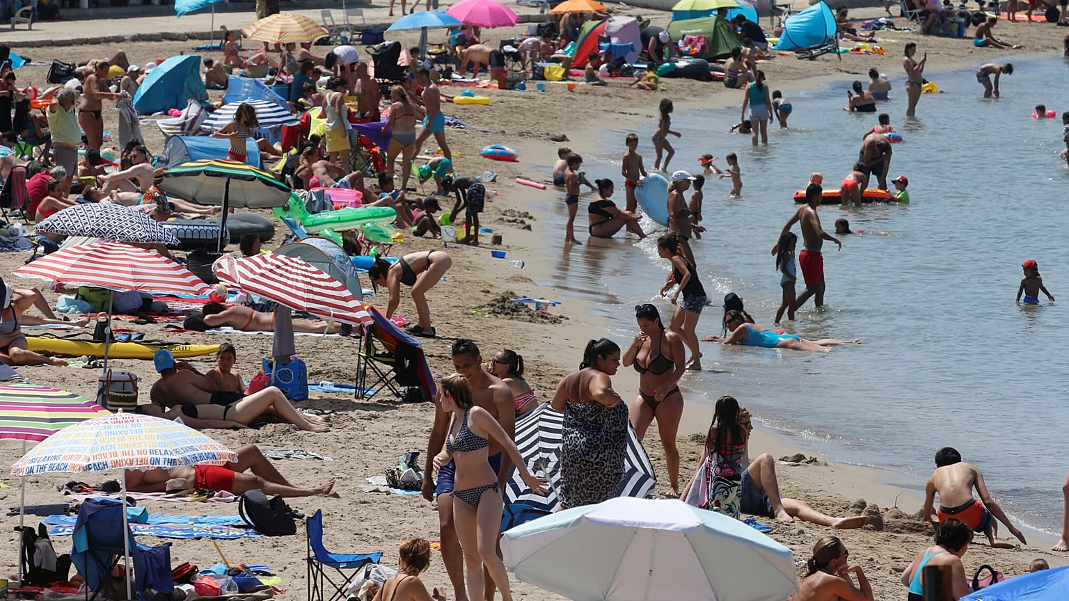 People cool off in the sea in Marseille as a heatwave hits much of the country, France, June 28, 2019.
