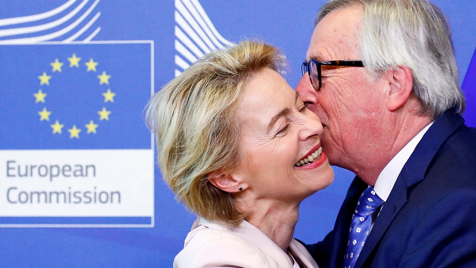 German Defense Minister von der Leyen poses with EU Commission President Juncker in Brussels