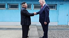Donald Trump and Kim Jong-Un meet at the DMZ.