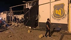 Dozens killed in Libya after air strike hits migrant centre outside of Tripoli