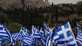 Main opposition New Democracy conservative party leader Kyriakos Mitsotakis waves to supporters during a pre-election rally in Athens, Greece, July 4, 2019.