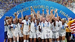 Carli Lloyd of the U.S. and team mates celebrate winning the women's world cup with the trophy.