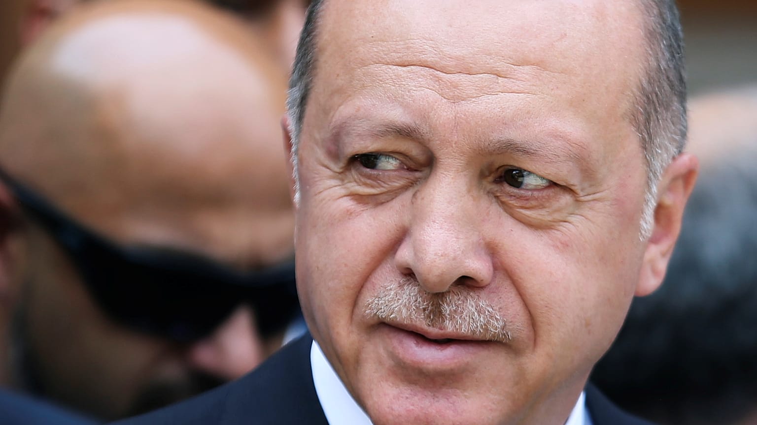 Turkey's President Recep Tayyip Erdogan pays his respects at a convoy carrying remains of the Srebrenica genocide victims, in Sarajevo, Bosnia and Herzegovina,