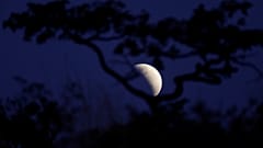 A moon is seen during a partial lunar eclipse in Brasilia