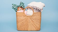 A shopping bag filled with shoes and clothes