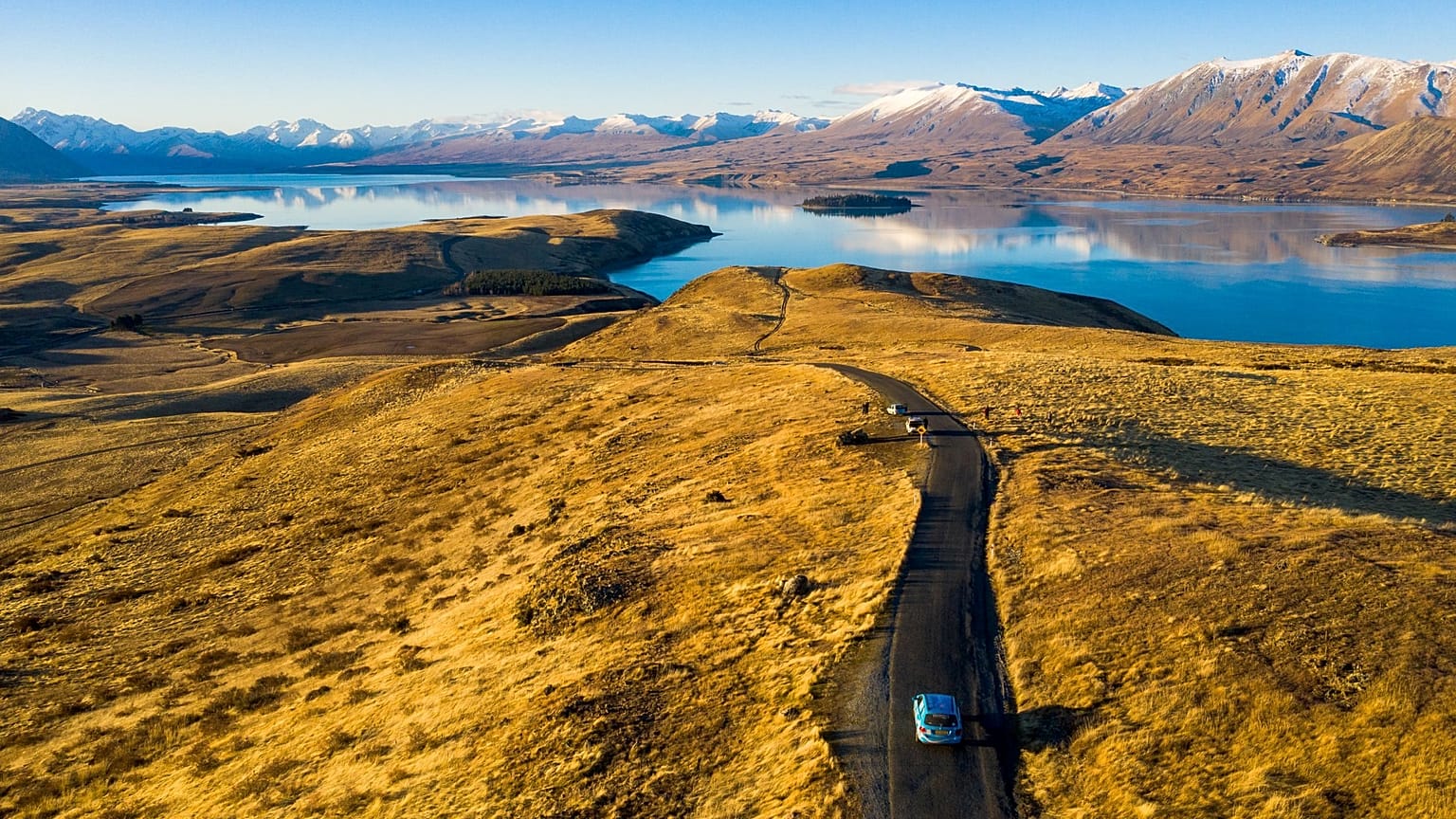 Wiebe Wakker drives his electric vehicle along Lake Tekapo, New Zealand 