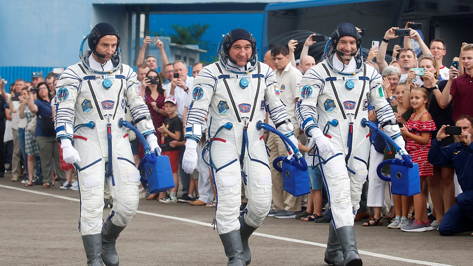 (L-R) Andrew Morgan, Alexander Skvortsov and Luca Parmitano preparing for takeoff