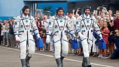 (L-R) Andrew Morgan, Alexander Skvortsov and Luca Parmitano preparing for takeoff