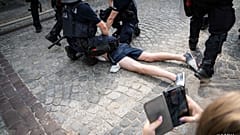 A photo posted on social media of police arresting an anti-LGBT protester
