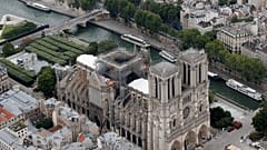 A view shows the damaged roof of Notre-Dame de Paris during restoration work, three months after a fire that devastated the cathedral in Paris