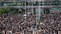 Protesters in Hong Kong defy authorities and march again