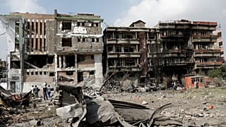 FILE PHOTO: Damaged buildings are seen after Sunday's attack in Kabul, Afghanistan July 29, 2019.