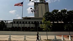  A man walks in front of the U.S. Embassy in Phnom Penh, Cambodia, April 14, 2018. REUTERS/Samrang Pring 