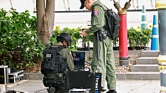 Police Explosive Ordnance Disposal (EOD) officers work following a small explosion at a site in Bangkok, Thailand, August 2, 2019. 