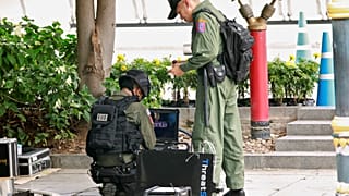 Police Explosive Ordnance Disposal (EOD) officers work following a small explosion at a site in Bangkok, Thailand, August 2, 2019. 