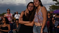 Amber Ruiz and Jazmyn Blake embrace during a vigil a day after a mass shooting at a Walmart store in El Paso, Texas, U.S. August 4, 2019. 