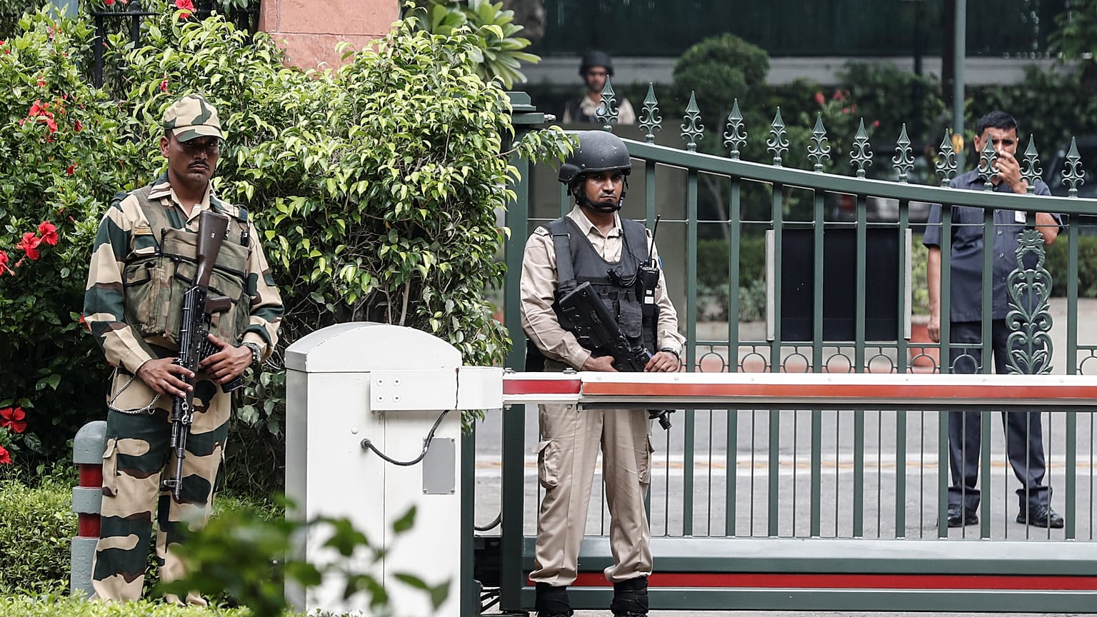Security personnel stand guard outside Indian Prime Minister Narendra Modi's house in New Delhi, India, August 5, 2019. 