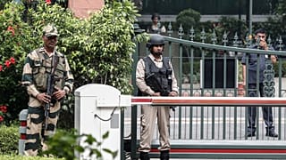 Security personnel stand guard outside Indian Prime Minister Narendra Modi's house in New Delhi, India, August 5, 2019. 
