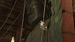 Watch: Worshippers dust the statue of Buddha ahead of festival