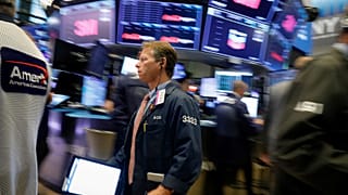 Traders on the floor of the New York Stock Exchange.