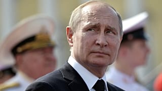 Russian President Vladimir Putin attends the Navy Day parade in Saint Petersburg, Russia July 28, 2019.