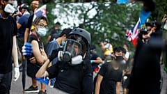 Police fire tear gas at anti-government protesters in Hong Kong