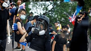 Police fire tear gas at anti-government protesters in Hong Kong