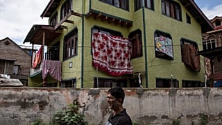 Some signs of normality return to Kashmir, but India's clampdown still strict