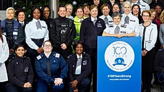 Khafi (back row, third from left) was part of the campaign to celebrate 100 years of women in the Met Police