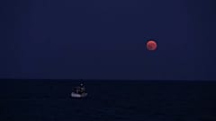 Watch: Full moon casts a glow by Greece's Koroni castle